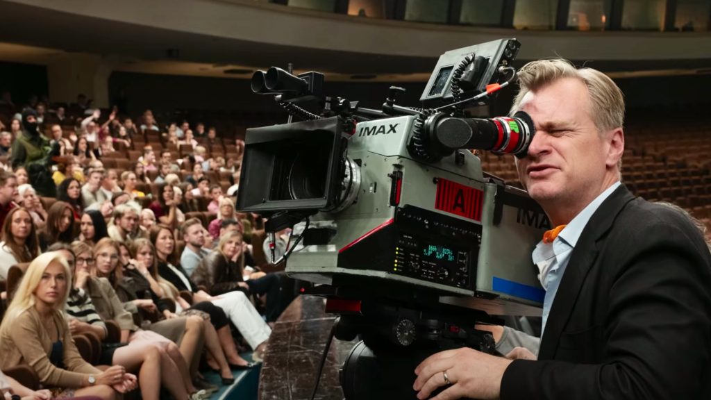 Tenet behind the scene: Christopher Nolan with an IMAX camera. Picture: Warner Bros.