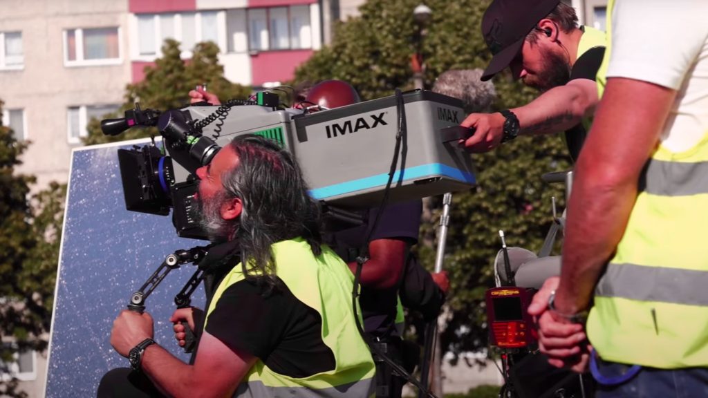 Tenet behind the scene: DP Hoyte van Hoytema operating an IMAX camera. Picture: Warner Bros.