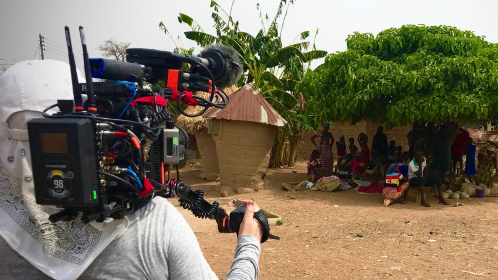 DP Claudia Raschke in Nigeria filming village life and clean water shortage. Photo by Lucas Millard